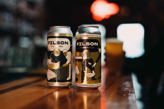 Filson Says “Cheers to 125 Years” With Stillwater Brewing Collab - All About Apres Ski